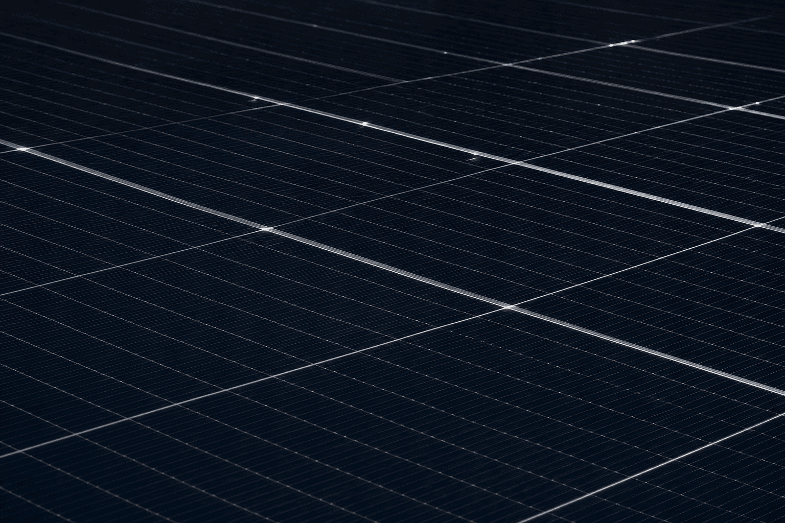 Dark photovoltaic cells crossed by a fine orange circuit network